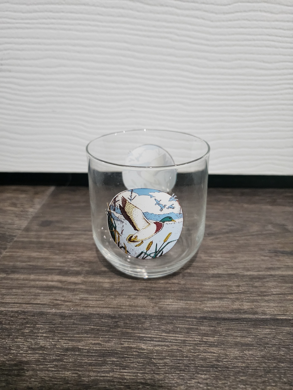 Vintage lowball / rocks glass featuring duck decal